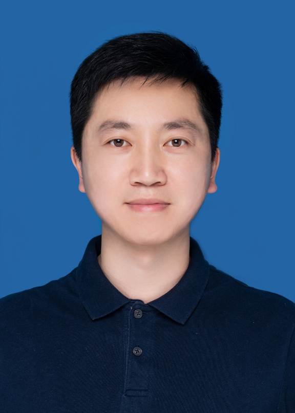A person in a blue shirt Description automatically generated with low confidence